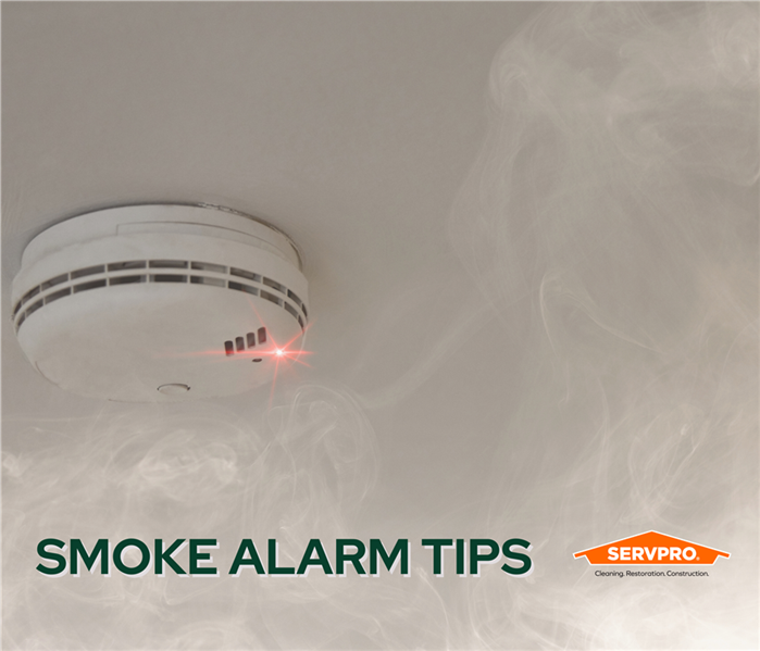 smoke rising to smoke alarm in a home in Ft Worth, Texas, SERVPRO of East Ft Worth logo