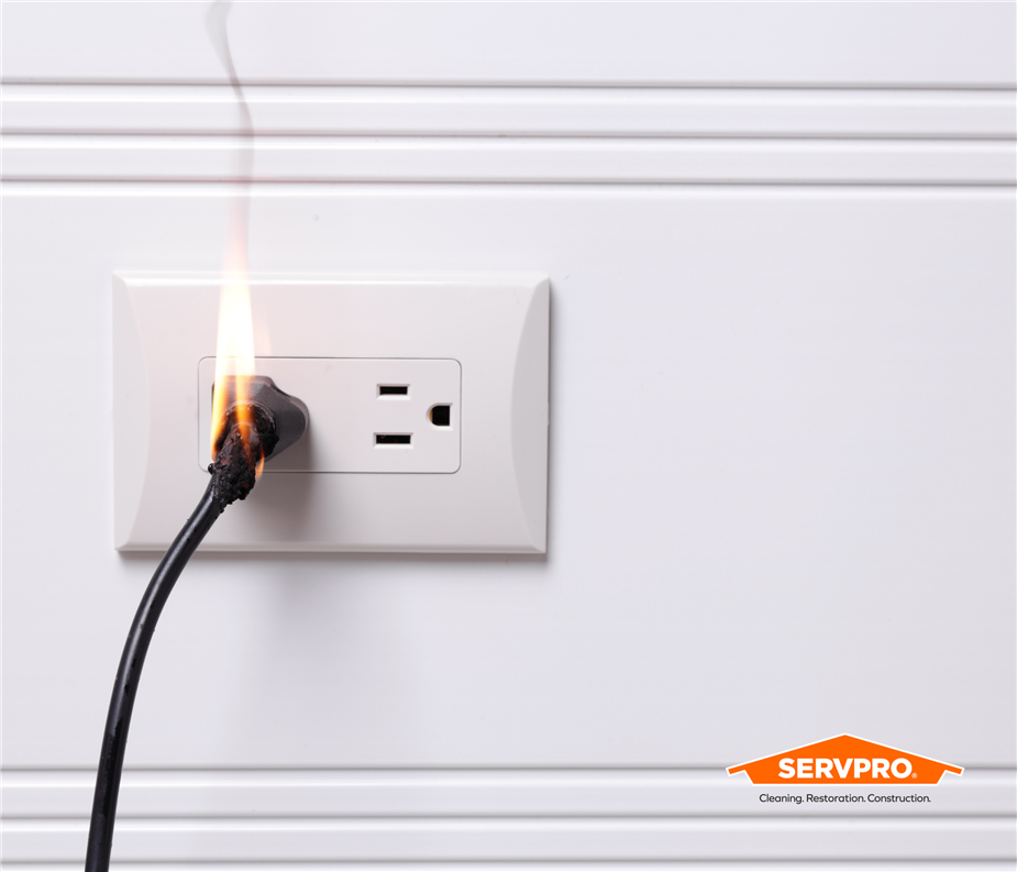 electrical fire coming from a plug in a socket in a home in Ft Worth, Texas